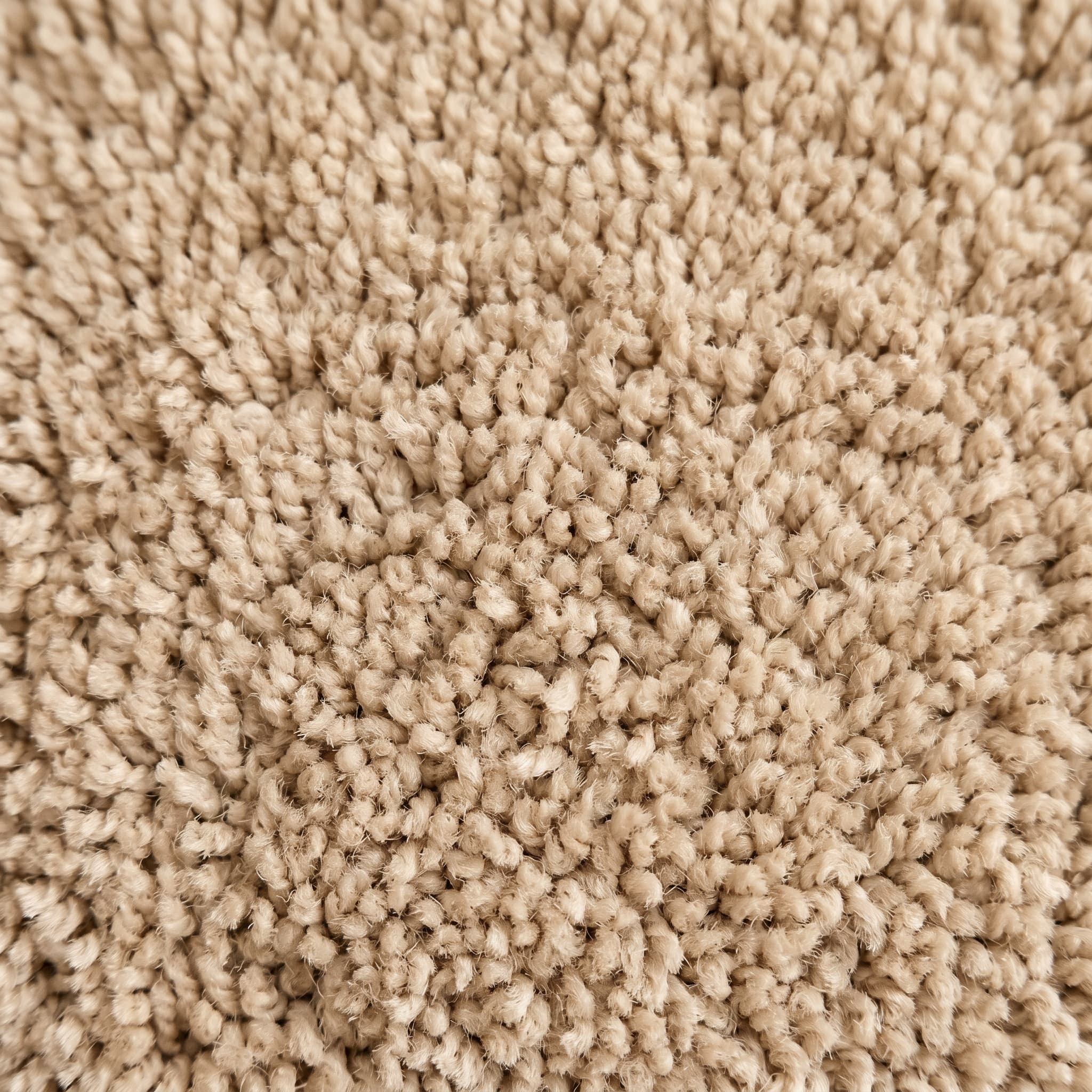 Plush light almond cut-pile carpet swatch