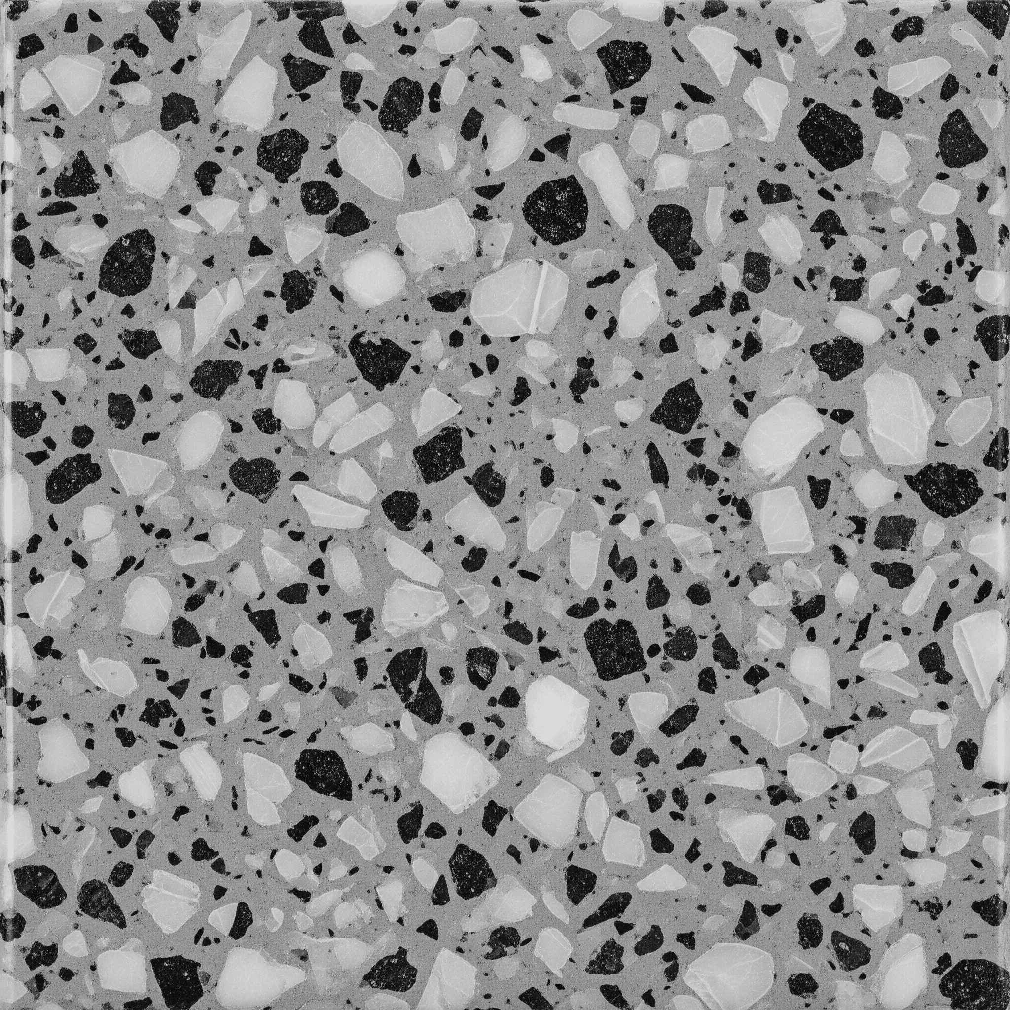 Ice Grey quartz — cool medium gray surface with darker charcoal flecks and pale white speckled chips