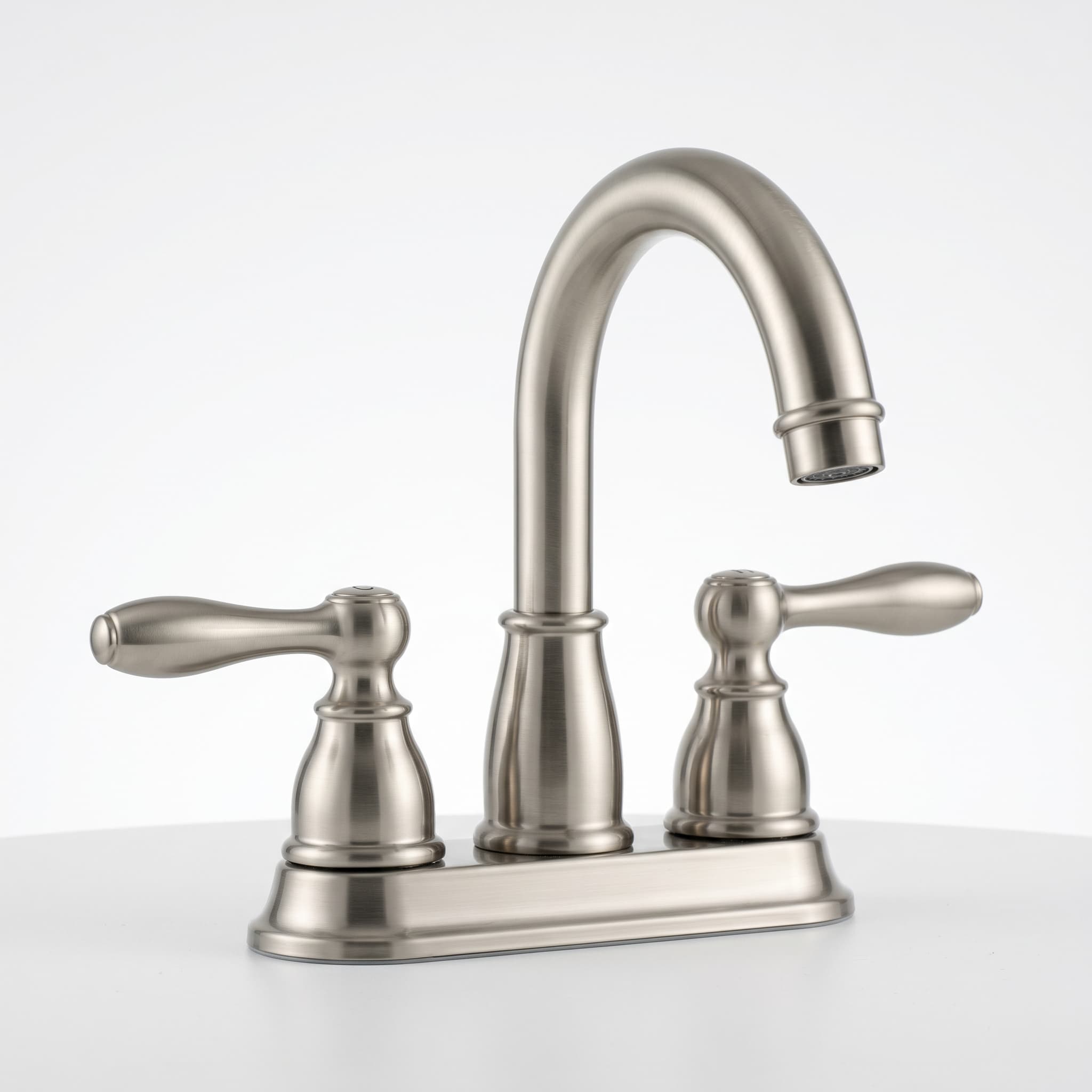 Brushed nickel centerset two-handle bathroom faucet with curved spout