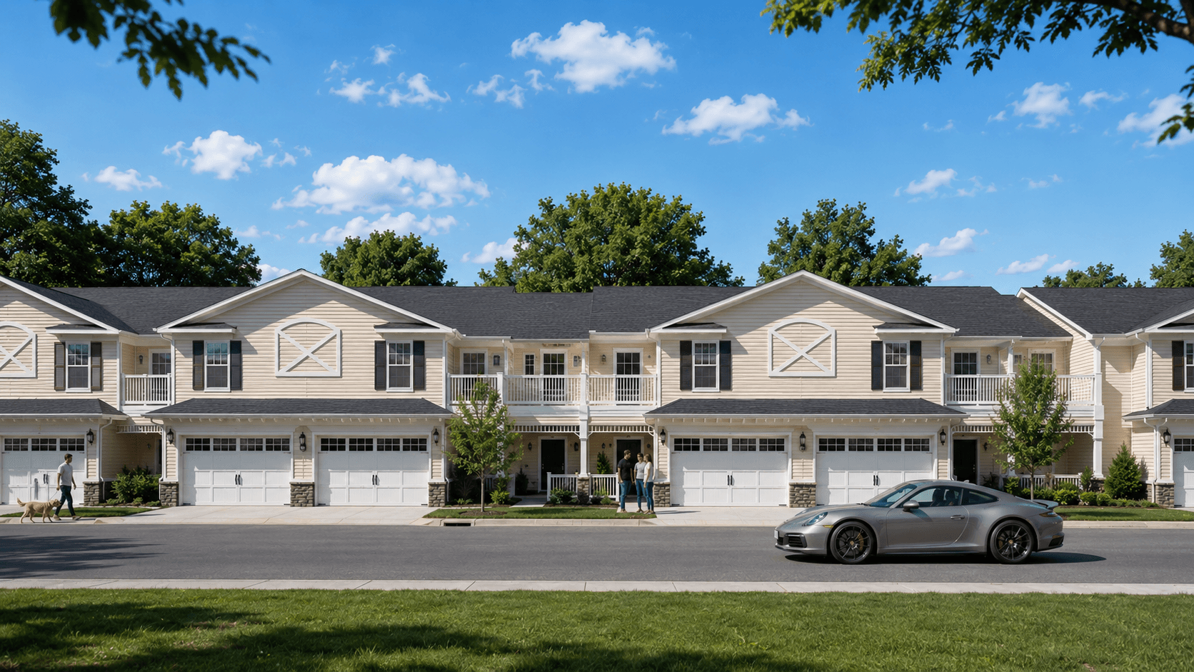 Photographic-style streetscape rendering of Pointe at Silver Springs — symmetric two-story townhome row, two-car garages, master-suite balconies, lawn and trees